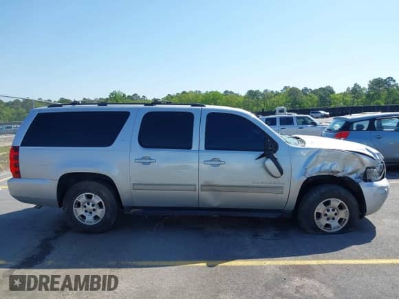 2014 Chevrolet Suburban LT z VIN 1GNSCJE0XER124222, wystawiony jako IAAI lot #41994798 z przebiegiem 268 836 mil mil oraz . Historia ofert i sprzedaży dostępna na DreamBid. Obrazek 13.
