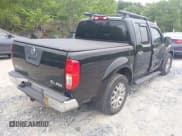 ✅ 2011 Nissan Frontier Pro-4X • VIN: 1N6AD0EV9BC451293 • Lot: 42286309. Listed on IAAI with 77,887 mi. Free auction sales archive from the USA and detailed vehicle history report at DreamBid. Image 4.