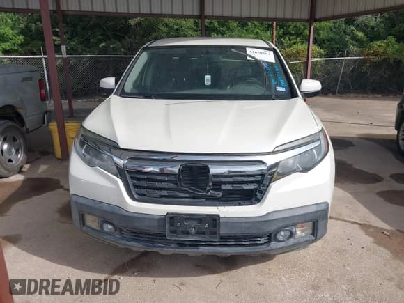 ✅ 2017 Honda Ridgeline RTL-T • VIN: 5FPYK2F67HB004457 • Lot: 42650294. Listed on IAAI with 44,046 mi. Free auction sales archive from the USA and detailed vehicle history report at DreamBid. Image 12.