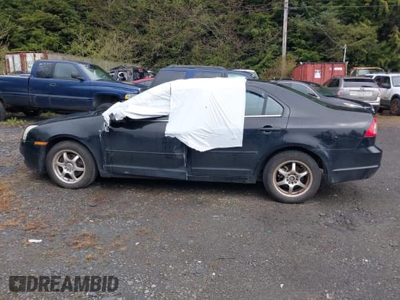 ✅ 2006 Mercury Milan • VIN: 3MEFM07Z06R629378 • Lot: 42087954. Listed on IAAI with 84,404 mi. Free auction sales archive from the USA and detailed vehicle history report at DreamBid. Image 14.