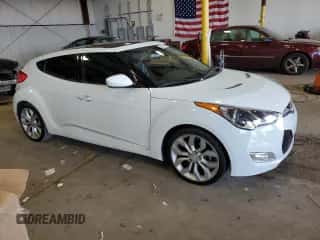 2015 Hyundai Veloster z VIN KMHTC6AD0FU236993, wystawiony jako Copart lot #62411173 z przebiegiem 83 612 mil mil oraz . Historia ofert i sprzedaży dostępna na DreamBid. Obrazek 4.