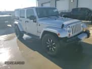 ✅ 2012 Jeep Wrangler Unlimited Sahara • VIN: 1C4BJWEG6CL228277 • Lot: 85567775. Listed on Copart with 140,765 mi. Free auction sales archive from the USA and detailed vehicle history report at DreamBid. Image 14.