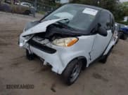 ✅ 2009 Smart fortwo Pure • VIN: WMEEJ31X39K314325 • Лот: 41607981. Опубликован ранее на IAAI с пробегом 59 684 миль. Бесплатный доступ к архиву аукционных продаж из США и подробный отчёт об истории автомобиля на DreamBid. Изображение 2.