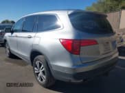 ✅ 2018 Honda Pilot EX-L • VIN: 5FNYF6H5XJB013667 • Lot: 43400037. Listed on IAAI with 111,947 mi. Free auction sales archive from the USA and detailed vehicle history report at DreamBid. Image 3.