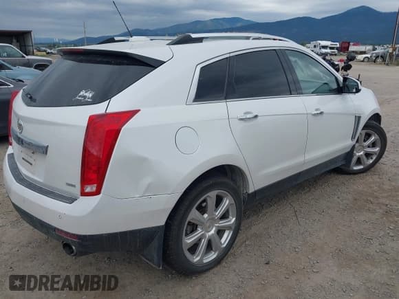 ✅ 2016 Cadillac SRX Premium Collection • VIN: 3GYFNGE32GS505204 • Lot: 42704169. Listed on IAAI with 149,035 mi. Free auction sales archive from the USA and detailed vehicle history report at DreamBid. Image 4.