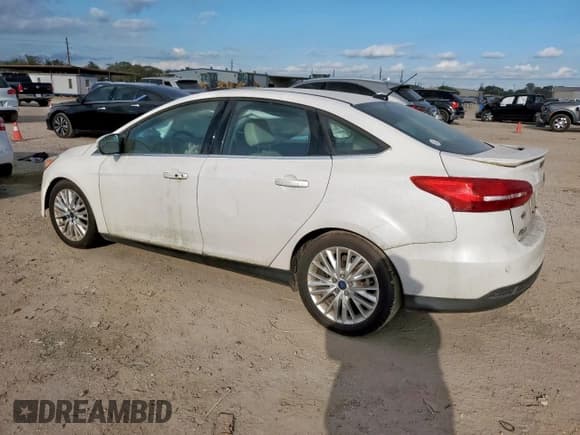 ✅ 2018 Ford Focus Titanium • VIN: 1FADP3J25JL314733 • Lot: 93067665. Wystawiony na Copart z przebiegiem 102 271 mil. Bezpłatny archiwum sprzedaży aukcyjnych z USA i szczegółowy raport historii pojazdu na DreamBid. Zdjęcie 2.
