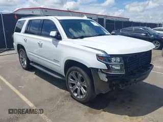 2017 Chevrolet Tahoe LT with VIN 1GNSCBKC4HR288848, listed as a IAAI auction lot 42806850 with 133,190 mi miles and . Bid and sale history available at DreamBid. Image 1.
