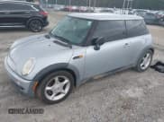✅ 2004 MINI Hardtop • VIN: WMWRC33414TJ57004 • Lot: 43058084. Listed on IAAI with 165,723 mi. Free auction sales archive from the USA and detailed vehicle history report at DreamBid. Image 2.