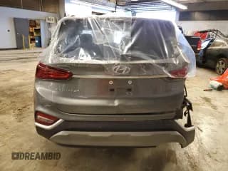 ✅ 2019 Hyundai Santa Fe SE • VIN: 5NMS2CAD3KH031283 • Lot: 38887963. Wystawiony na Copart z przebiegiem 57 939 mil. Bezpłatny archiwum sprzedaży aukcyjnych z USA i szczegółowy raport historii pojazdu na DreamBid. Zdjęcie 6.