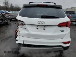 ✅ 2018 Hyundai Santa Fe 2.4L • VIN: 5NMZUDLB4JH076144 • Лот: 73721222. Опубликован ранее на Copart с пробегом 41 793 миль. Бесплатный доступ к архиву аукционных продаж из США и подробный отчёт об истории автомобиля на DreamBid. Изображение 6.