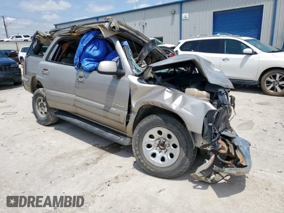 ✅ 2001 GMC Yukon SLE • VIN: 1GKEC13T61J233311 • Lot: 56759275. Listed on Copart with Not provided. Free auction sales archive from the USA and detailed vehicle history report at DreamBid. Image 4.