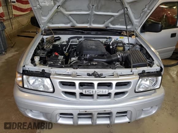 ✅ 2000 Isuzu Rodeo • VIN: 4S2DM58WXY4346884 • Лот: 43108675. Опубликован ранее на Copart с пробегом 144 306 миль. Бесплатный доступ к архиву аукционных продаж из США и подробный отчёт об истории автомобиля на DreamBid. Изображение 14.