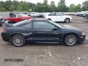 ✅ 1999 Mitsubishi Eclipse GS • VIN: 4A3AK44Y3XE121072 • Lot: 43030479. Listed on IAAI with 66,096 mi. Free auction sales archive from the USA and detailed vehicle history report at DreamBid. Image 13.