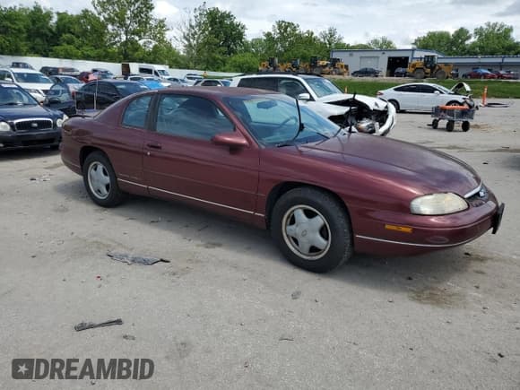✅ 1999 Chevrolet Monte Carlo LS • VIN: 2G1WW12M1X9225597 • Lot: 61053435. Listed on Copart with 161,466 mi. Free auction sales archive from the USA and detailed vehicle history report at DreamBid. Image 4.