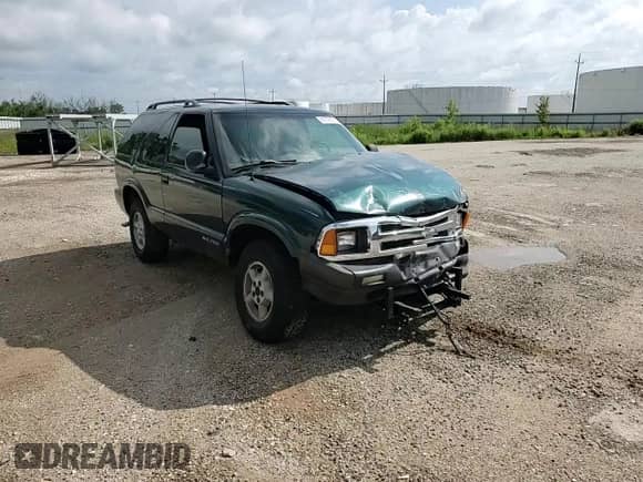 1996 Chevrolet Blazer z VIN 1GNCT18W0TK221519, wystawiony jako Copart lot #61718135 z przebiegiem 129 589 mil mil oraz Czysty tytuł • Clean title. Historia ofert i sprzedaży dostępna na DreamBid. Obrazek 14.