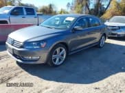 ✅ 2014 Volkswagen Passat SEL Premium • VIN: 1VWCN7A34EC120581 • Лот: 43649667. Опубликован ранее на IAAI с пробегом 112 597 миль. Бесплатный доступ к архиву аукционных продаж из США и подробный отчёт об истории автомобиля на DreamBid. Изображение 2.