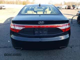 2013 Hyundai Azera z VIN KMHFG4JG4DA227048, wystawiony jako Copart lot #86703774 z przebiegiem 96 641 mil mil oraz Szkoda całkowita • Salvage title. Historia ofert i sprzedaży dostępna na DreamBid. Obrazek 6.