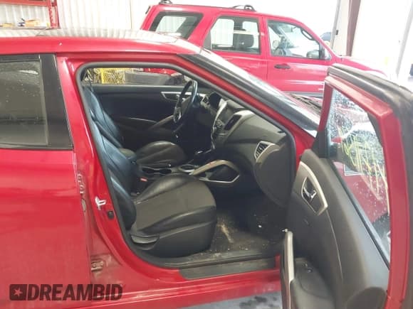 ✅ 2013 Hyundai Veloster w/Black Int • VIN: KMHTC6AD3DU099335 • Lot: 41711569. Wystawiony na IAAI z przebiegiem 159 847 mil. Bezpłatny archiwum sprzedaży aukcyjnych z USA i szczegółowy raport historii pojazdu na DreamBid. Zdjęcie 5.