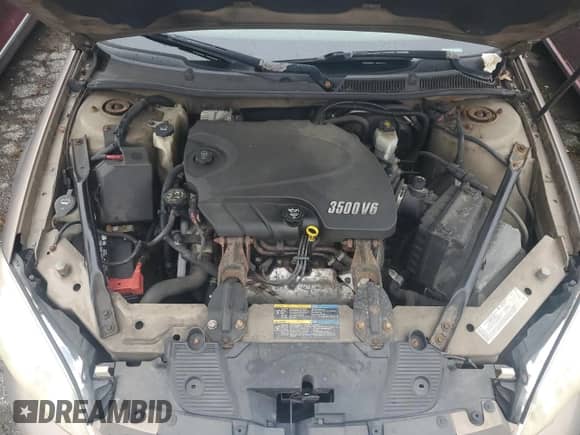 2006 Chevrolet Impala LT z VIN 2G1WT58N569128174, wystawiony jako Copart lot #85081334 z przebiegiem 182 431 mil mil oraz Czysty tytuł • Clean title. Historia ofert i sprzedaży dostępna na DreamBid. Obrazek 11.