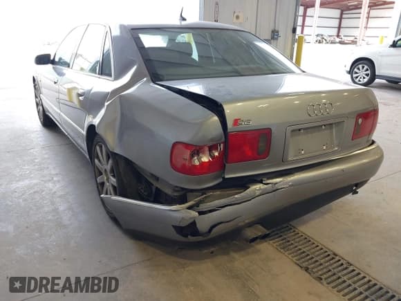 ✅ 2003 Audi S8 • VIN: WAUGU44D33N002658 • Lot: 43682552. Listed on IAAI with 192,597 mi. Free auction sales archive from the USA and detailed vehicle history report at DreamBid. Image 6.