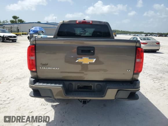 ✅ 2015 Chevrolet Colorado 2WD LT • VIN: 1GCGSBE34F1257494 • Лот: 66269195. Опубликован ранее на Copart с пробегом 92 038 миль. Бесплатный доступ к архиву аукционных продаж из США и подробный отчёт об истории автомобиля на DreamBid. Изображение 6.