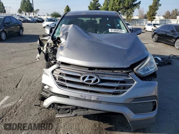 ✅ 2018 Hyundai Santa Fe 2.4L • VIN: 5XYZT3LB5JG545054 • Lot: 91289535. Listed on Copart with 75,555 mi. Free auction sales archive from the USA and detailed vehicle history report at DreamBid. Image 5.