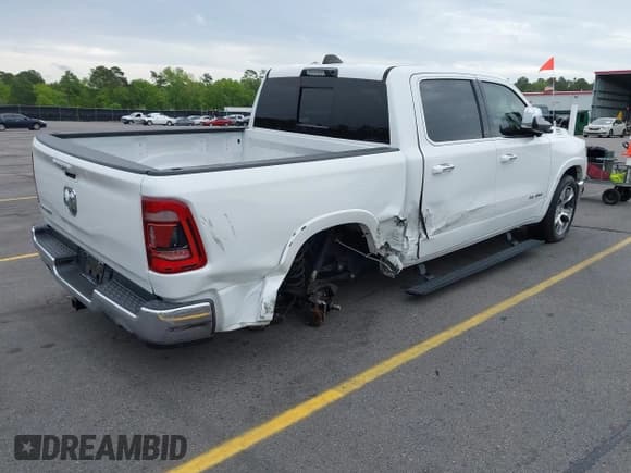 ✅ 2021 Ram 1500 Laramie • VIN: 1C6RREJT1MN709653 • Lot: 41951192. Listed on IAAI with 39,688 mi. Free auction sales archive from the USA and detailed vehicle history report at DreamBid. Image 4.