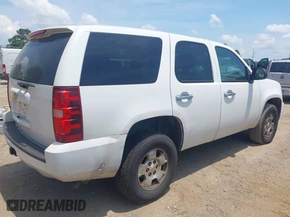 2011 Chevrolet Tahoe Commercial with VIN 1GNSK2E05BR372771, listed as a IAAI auction lot 42840332 with 170,734 mi miles and . Bid and sale history available at DreamBid. Image 4.