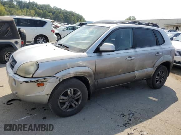 2006 Hyundai Tucson GLS z VIN KM8JN12DX6U280986, wystawiony jako Copart lot #69902194 z przebiegiem 212 956 mil mil oraz Szkoda całkowita • Salvage title. Historia ofert i sprzedaży dostępna na DreamBid. Obrazek 1.
