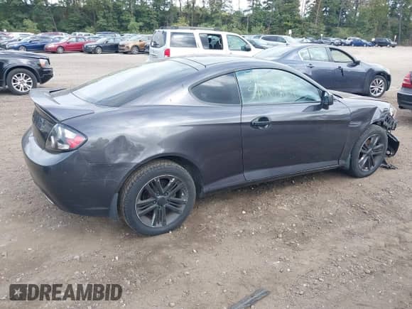 2008 Hyundai Tiburon GS с VIN KMHHM66D88U284532, выставлен на аукционе IAAI как лот 40490154 с пробегом 177 813 миль миль и . История ставок и продаж доступна на DreamBid. Изображение 4.