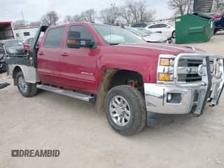2019 Chevrolet Silverado 2500HD LT with VIN 1GC1KSEY9KF103023, listed as a IAAI auction lot 41823944 with 143,028 mi miles and . Bid and sale history available at DreamBid. Image 1.