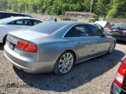 ✅ 2012 Audi A8 • VIN: WAURVAFDXCN001167 • Lot: 57227105. Listed on Copart with 154,409 mi. Free auction sales archive from the USA and detailed vehicle history report at DreamBid. Image 3.