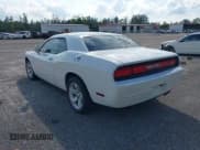 ✅ 2013 Dodge Challenger SXT • VIN: 2C3CDYAG5DH693813 • Lot: 43558979. Listed on IAAI with 188,863 mi. Free auction sales archive from the USA and detailed vehicle history report at DreamBid. Image 3.