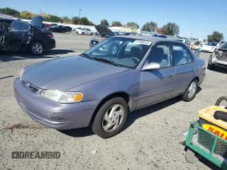 ✅ 1998 Toyota Corolla LE • VIN: 1NXBR18E5WZ099366 • Лот: 87099535. Опубликован ранее на Copart с пробегом 173 725 миль. Бесплатный доступ к архиву аукционных продаж из США и подробный отчёт об истории автомобиля на DreamBid. Изображение 1.
