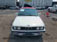 1991 BMW 3 Series z VIN WBABB2315MEC25347, wystawiony jako IAAI lot #42422155 z przebiegiem 163 909 mil mil oraz . Historia ofert i sprzedaży dostępna na DreamBid. Obrazek 11.