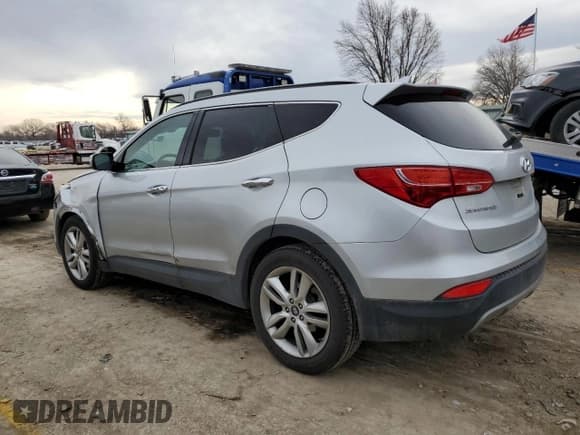 ✅ 2015 Hyundai Santa Fe • VIN: 5XYZWDLA6FG257314 • Лот: 39433434. Опубликован ранее на Copart с пробегом 76 956 миль. Бесплатный доступ к архиву аукционных продаж из США и подробный отчёт об истории автомобиля на DreamBid. Изображение 2.