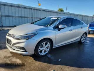 ✅ 2018 Chevrolet Cruze Premier • VIN: 1G1BF5SM8J7108758 • Лот: 84032945. Размещён на Copart с пробегом 75 319 миль миль. Получите бесплатный доступ к архиву аукционных продаж из США и посмотрите подробный отчёт об истории автомобиля на DreamBid. Изображение 1.