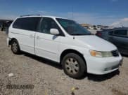 ✅ 2002 Honda Odyssey EX-L • VIN: 2HKRL18792H500542 • Lot: 70146735. Listed on Copart with 257,266 mi. Free auction sales archive from the USA and detailed vehicle history report at DreamBid. Image 4.