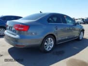 ✅ 2015 Volkswagen Jetta SE • VIN: 3VWD17AJ6FM406091 • Lot: 42539626. Listed on IAAI with 82,005 mi. Free auction sales archive from the USA and detailed vehicle history report at DreamBid. Image 4.