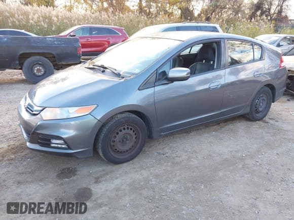 ✅ 2013 Honda Insight LX • VIN: JHMZE2H57DS004186 • Lot: 43671873. Listed on IAAI with 276,397 mi. Free auction sales archive from the USA and detailed vehicle history report at DreamBid. Image 2.