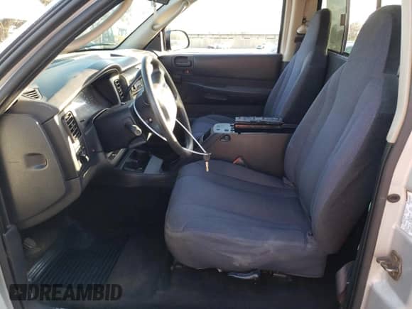 2003 Dodge Dakota с VIN 1D7GG16X33S130101, выставлен на аукционе Copart как лот 85999314 с пробегом 221 292 миль миль и Списание • Salvage title. История ставок и продаж доступна на DreamBid. Изображение 7.