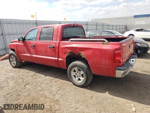 2006 Dodge Dakota SLT with VIN 1D7HE48K76S701994, listed as a Copart auction lot 72152274 with 145,040 mi miles and Salvage title. Bid and sale history available at DreamBid. Image 2.