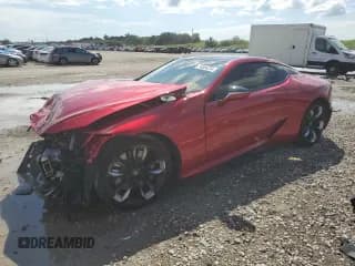 ✅ 2024 Lexus LC 500h • VIN: JTHBY5AYXRA002606 • Лот: 74554254. Опубликован ранее на Copart с пробегом 8 439 миль. Бесплатный доступ к архиву аукционных продаж из США и подробный отчёт об истории автомобиля на DreamBid. Изображение 1.
