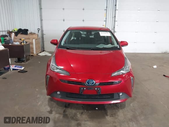 ✅ 2021 Toyota Prius LE • VIN: JTDL9MFU1M3025871 • Lot: 42130143. Listed on IAAI with 119,145 mi. Free auction sales archive from the USA and detailed vehicle history report at DreamBid. Image 12.