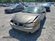 ✅ 2002 Pontiac Grand Am SE1 • VIN: 1G2NF52F42C283088 • Lot: 57897425. Listed on Copart with 139,473 mi. Free auction sales archive from the USA and detailed vehicle history report at DreamBid. Image 14.