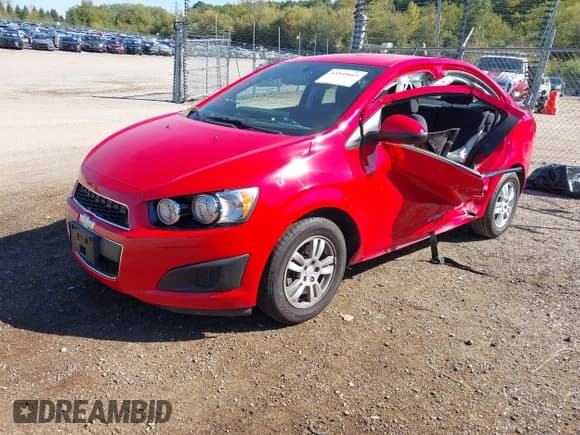 ✅ 2014 Chevrolet Sonic LT • VIN: 1G1JC5SB3E4243298 • Lot: 43349669. Listed on IAAI with 151,831 mi. Free auction sales archive from the USA and detailed vehicle history report at DreamBid. Image 18.