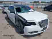 2014 Chrysler 300 S с VIN 2C3CCABG3EH262008, выставлен на аукционе IAAI как лот 42087435 с пробегом 248 794 миль миль и . История ставок и продаж доступна на DreamBid. Изображение 1.