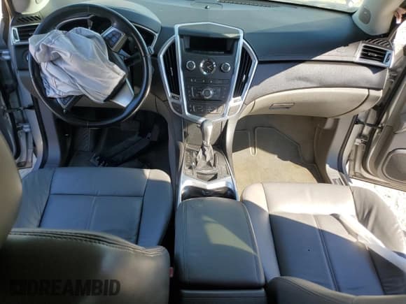 ✅ 2012 Cadillac SRX • VIN: 3GYFNGE37CS587957 • Лот: 82317315. Опубликован ранее на Copart с пробегом Не указан. Бесплатный доступ к архиву аукционных продаж из США и подробный отчёт об истории автомобиля на DreamBid. Изображение 8.