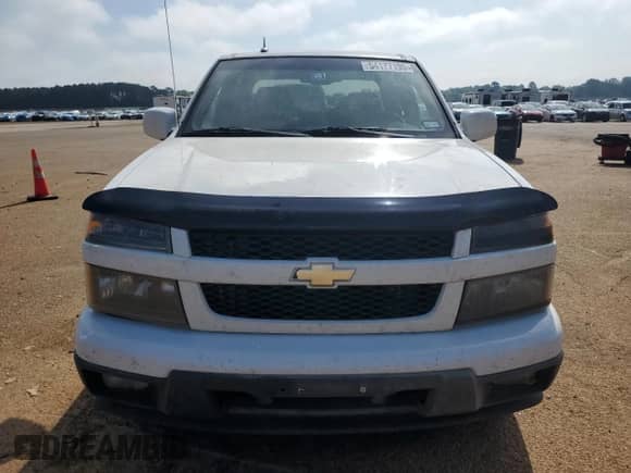 2012 Chevrolet Colorado 1LT z VIN 1GCDSCF94C8140979, wystawiony jako Copart lot #54177195 z przebiegiem 249 542 mil mil oraz Czysty tytuł • Clean title. Historia ofert i sprzedaży dostępna na DreamBid. Obrazek 5.