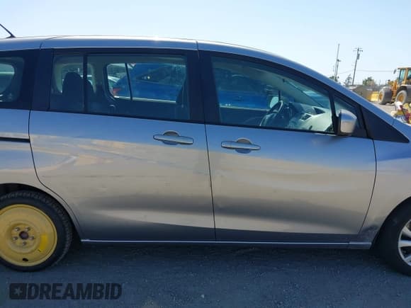 ✅ 2012 Mazda 5 Sport • VIN: JM1CW2BL9C0117627 • Lot: 42403991. Listed on IAAI with 124,239 mi. Free auction sales archive from the USA and detailed vehicle history report at DreamBid. Image 14.